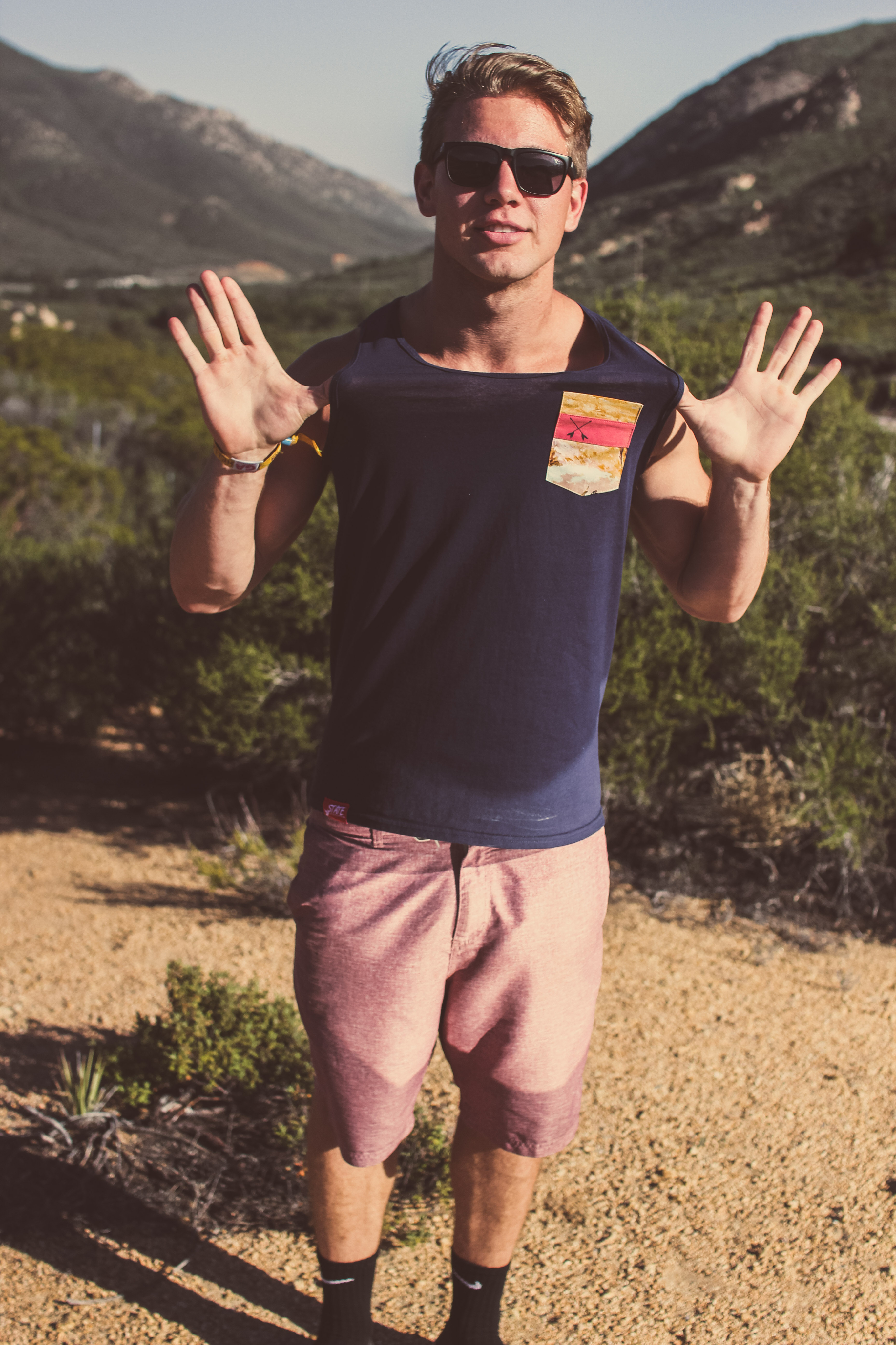 Young adult posing in State Collegewear clothing