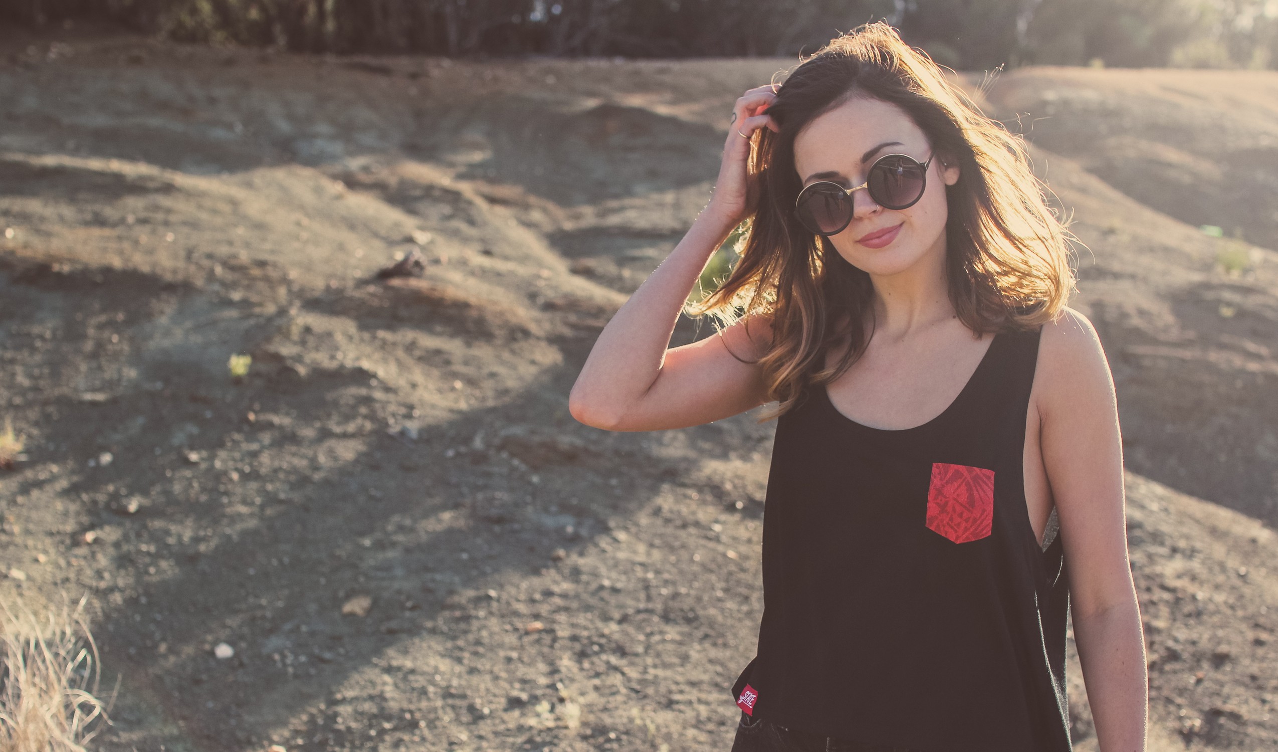 Young adult posing in State Collegewear clothing